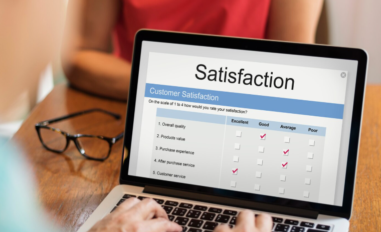 Customer satisfaction survey displayed on a laptop
